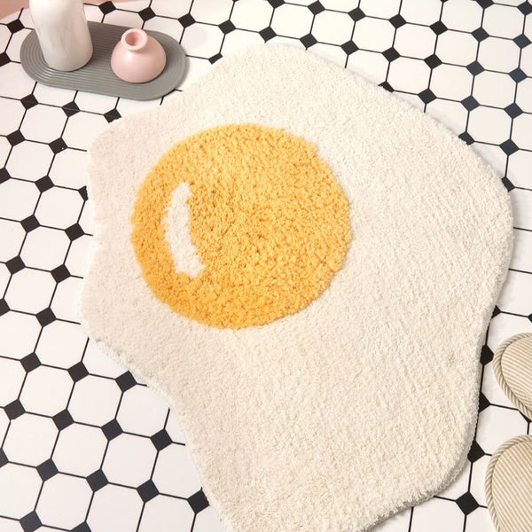 Alfombra de baño de huevo frito