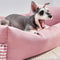Cama de sofá de perros y gatos con respaldo mejorado con volantes con volantes y gato