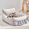 Cama de sofá de perros y gatos con respaldo mejorado con volantes con volantes y gato
