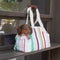Bolsa de transporte de mascotas de viaje portátil de rayas con rayas con estilo para gatos y propietarios